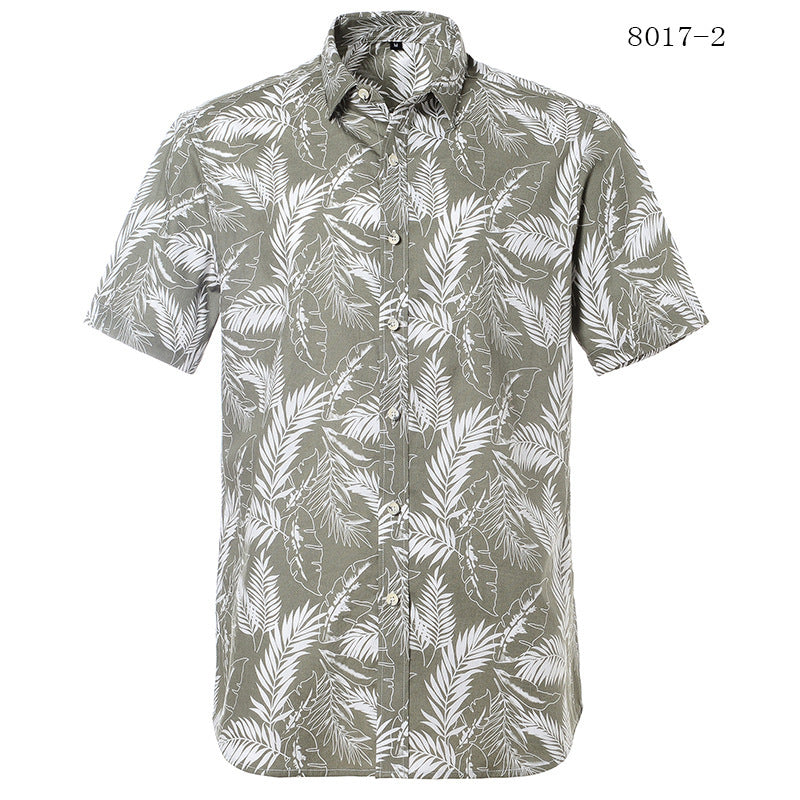 Short-sleeve shirt with leaf pattern on a white background