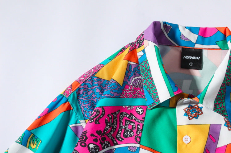 Colorful patterned shirt with brand label on a white background
