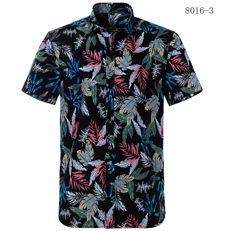 Short-sleeve shirt with colorful leaf pattern on a black background