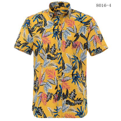 Yellow shirt with colorful leaf pattern on a white background